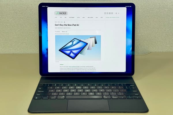 iPad Pro in Magic Keyboard showing Lifehacker article.