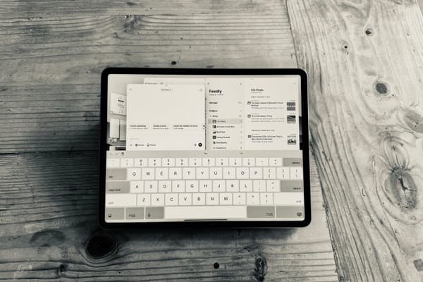 My preferred computer: iPad Pro on a wooden table.